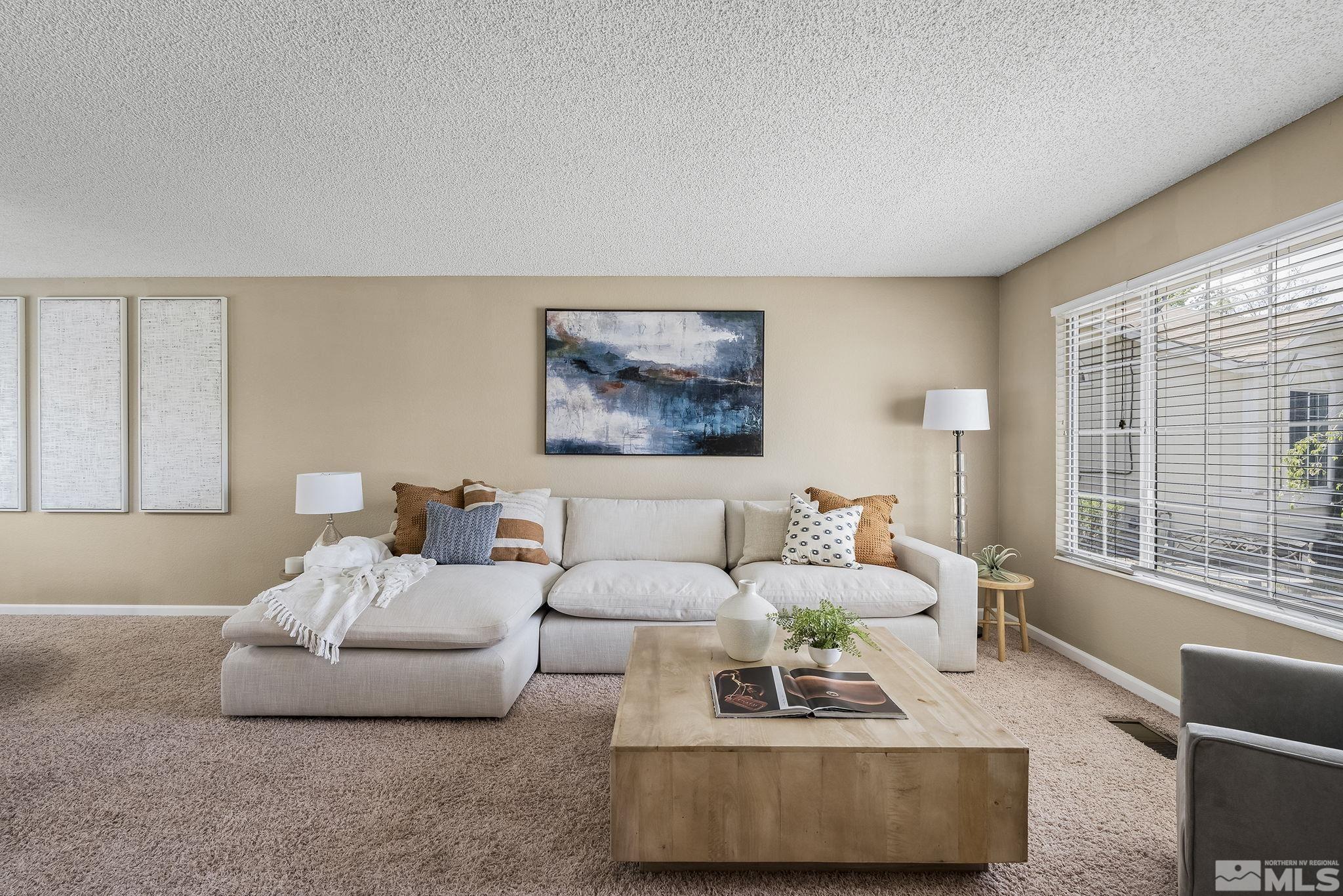 310 Kilborne Avenue Reno, NV 89509 - Photo 2 of 26 a living room with furniture and a large window