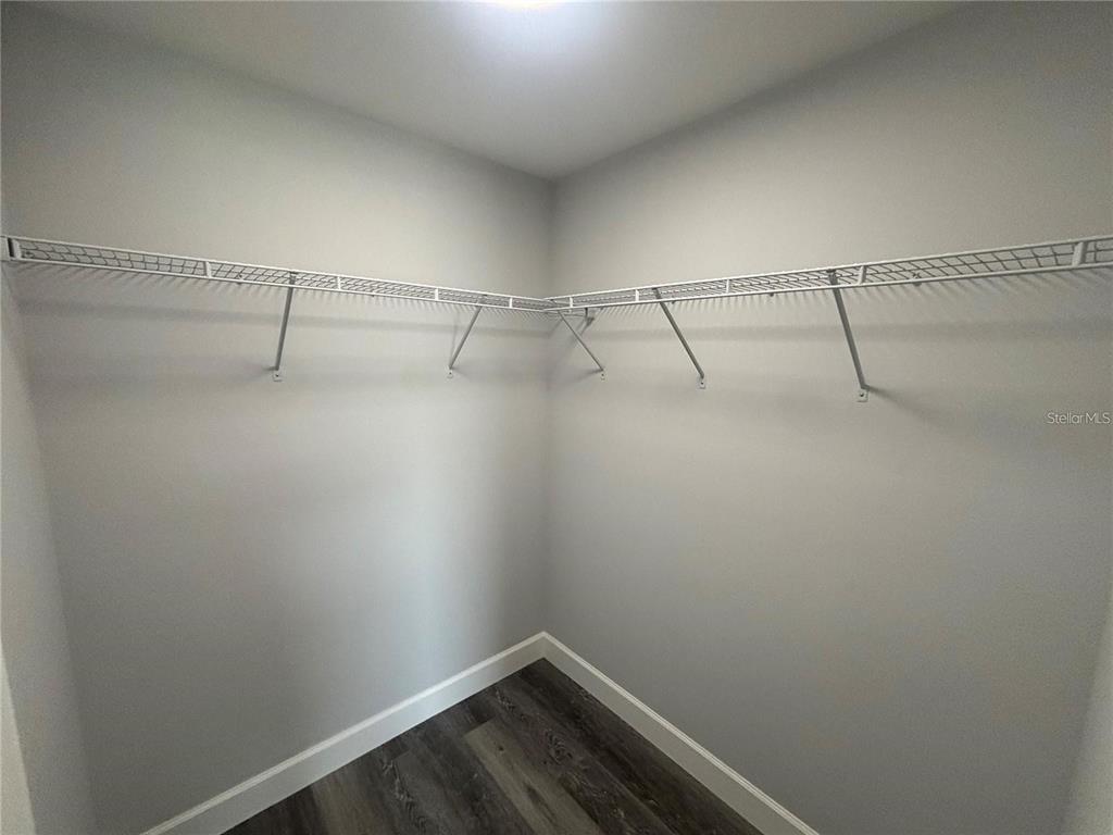 13187 Southwest 103rd Place Dunnellon, FL 34432 - Photo 13 of 49 a view of a room with racks on the wall