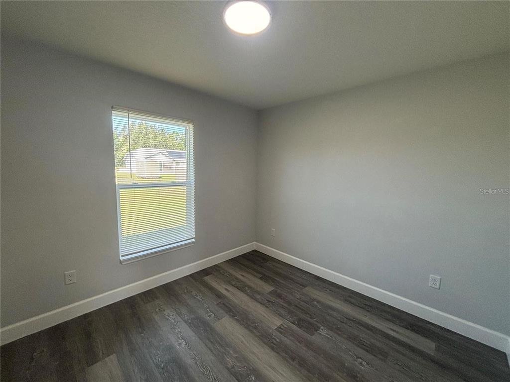 13187 Southwest 103rd Place Dunnellon, FL 34432 - Photo 15 of 49 an empty room with a window