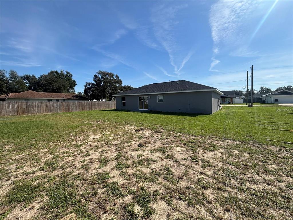 13187 Southwest 103rd Place Dunnellon, FL 34432 - Photo 18 of 49 a view of a lake with a big yard