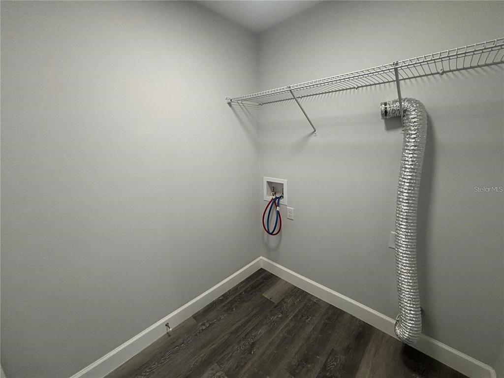 13187 Southwest 103rd Place Dunnellon, FL 34432 - Photo 23 of 49 a view of a room with racks on the wall