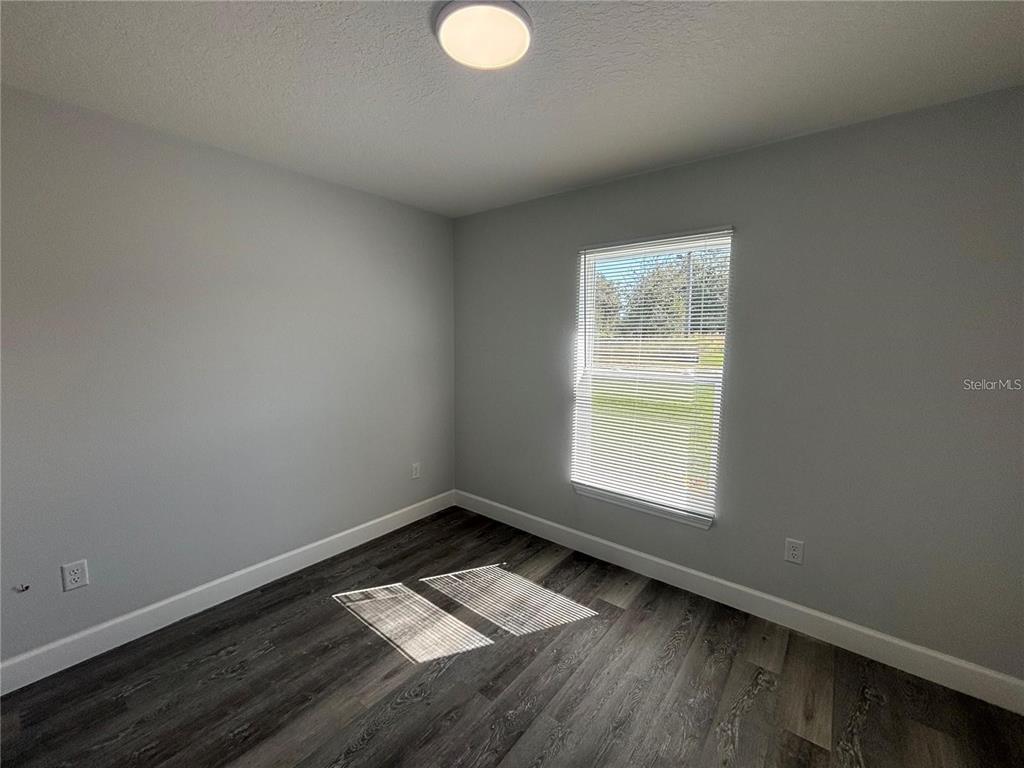 13187 Southwest 103rd Place Dunnellon, FL 34432 - Photo 26 of 49 an empty room with a window