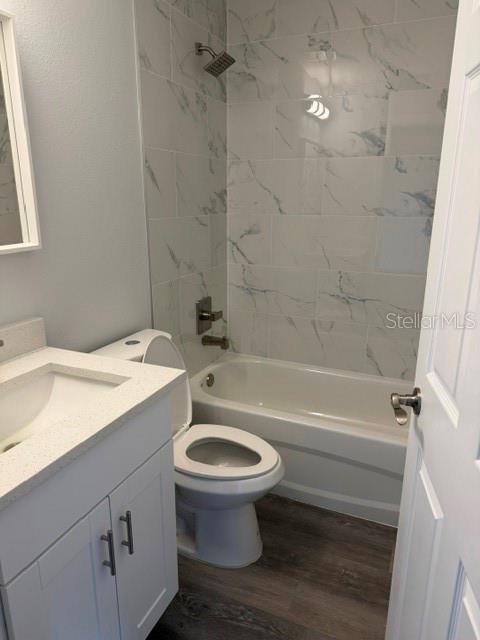 13187 Southwest 103rd Place Dunnellon, FL 34432 - Photo 40 of 49 a bathroom with a sink a toilet and a bathtub