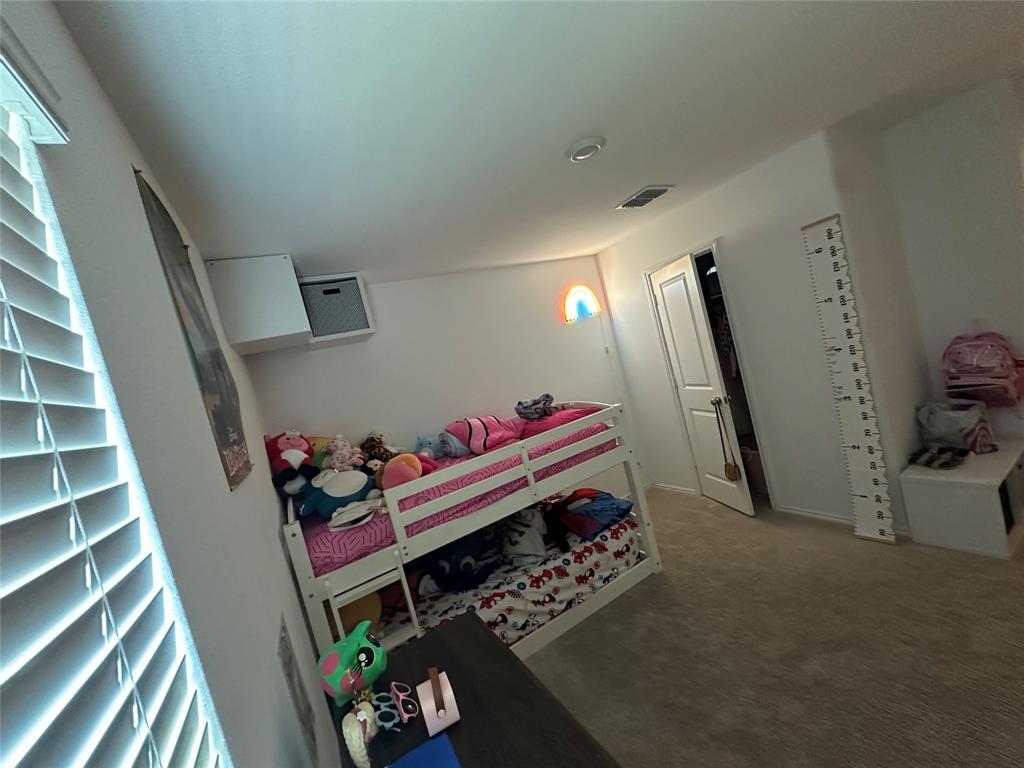 2928 Dora Drive Fort Worth, TX 76119 - Photo 8 of 15 a room with toys and wooden floor