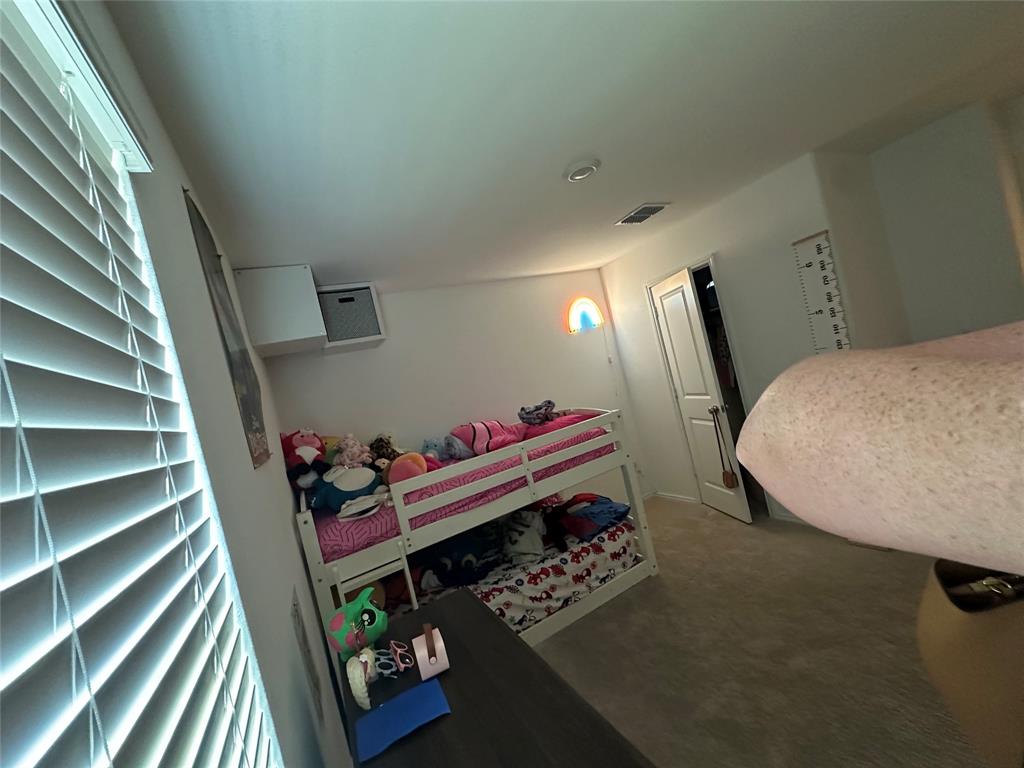 2928 Dora Drive Fort Worth, TX 76119 - Photo 10 of 15 a room with furniture and wooden floor