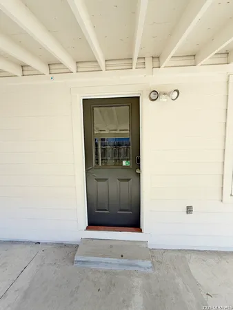 a bathroom with a sink and mirror