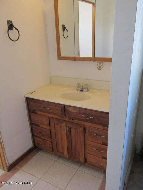 25700 North Reed Road Paulden, AZ 86334 - Photo 20 of 29 a bathroom with a sink and a mirror