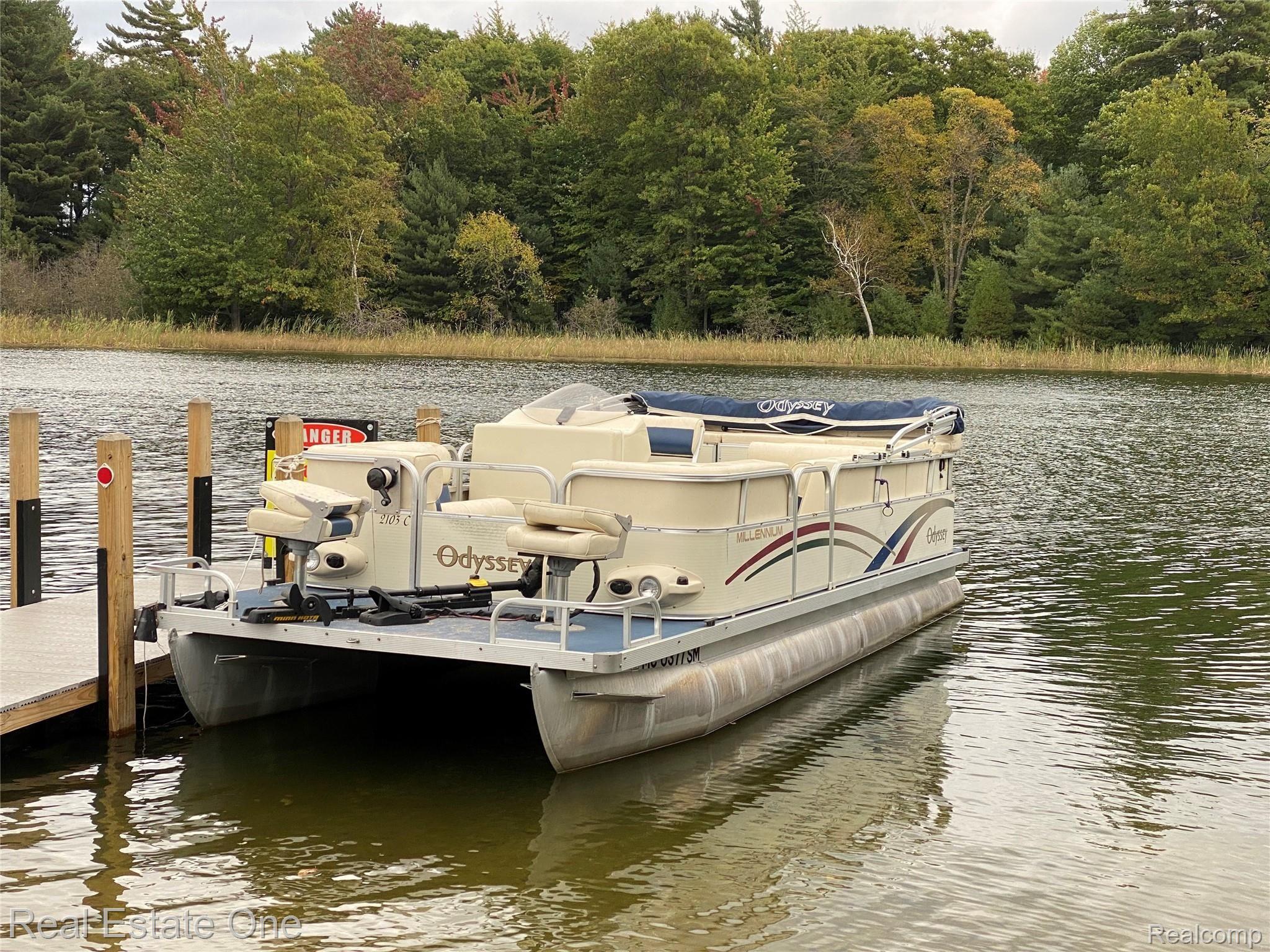2722 Piney Ridge Road Ludington, MI 49431 - Photo 59 of 64 Available 21 foot Odyssey with 70 hp Yamaha outboard. Motor is about 9 years old. Low usage, well maintained.