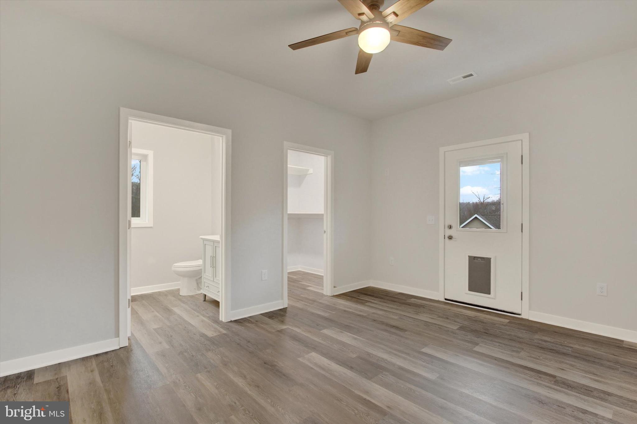 2 Pecan Trail Fairfield, PA 17320 - Photo 19 of 45 an empty room with wooden floor and ceiling fan
