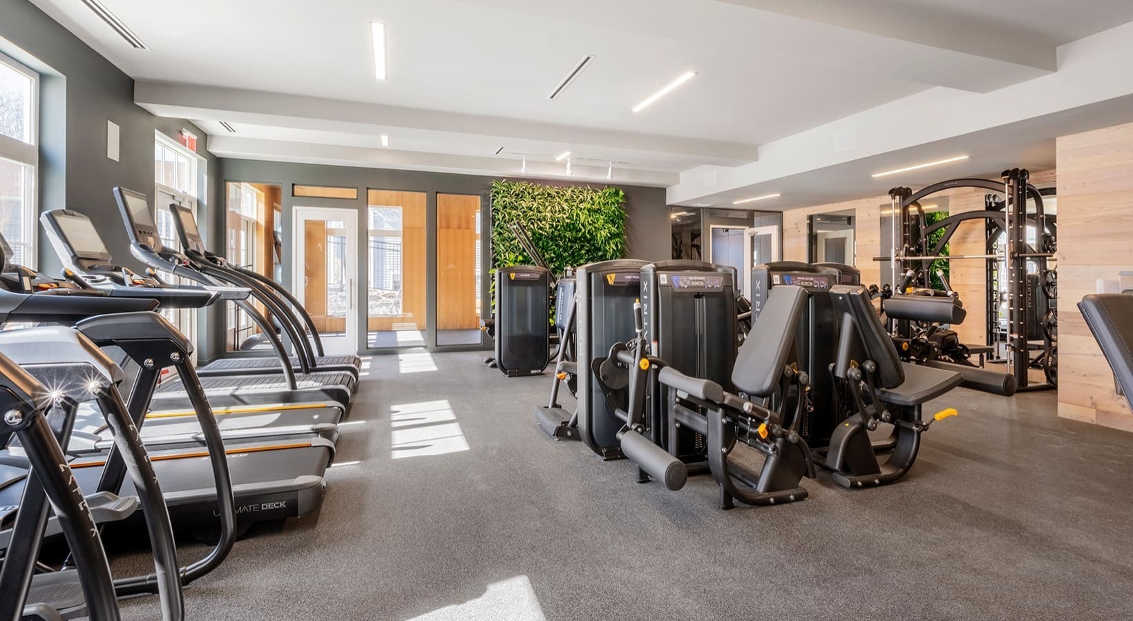333 Unquowa Road, Unit 310 Fairfield, CT 06824 - Photo 6 of 12 a view of a room with gym equipment