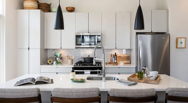 a bed room with a bed mirror and a window