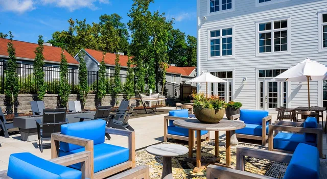 a view of a swimming pool with a patio