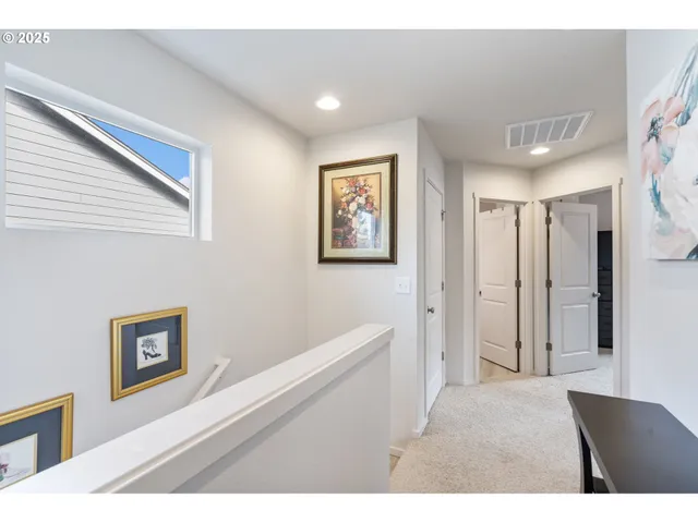a bedroom with a bed and a view of bathroom