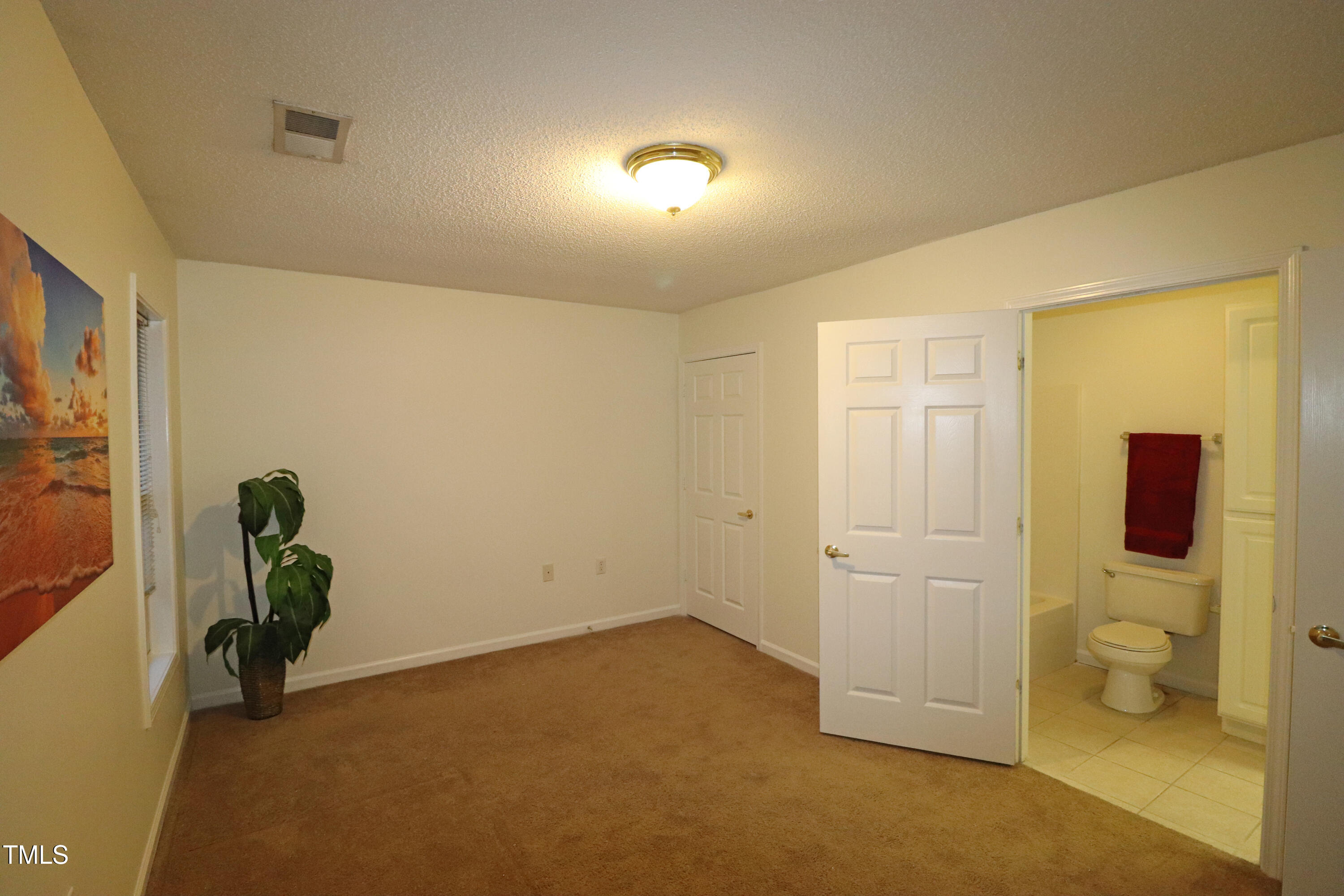 11321 Involute Place, Unit 102 Raleigh, NC 27617 - Photo 18 of 37 Bed 2 door to bath