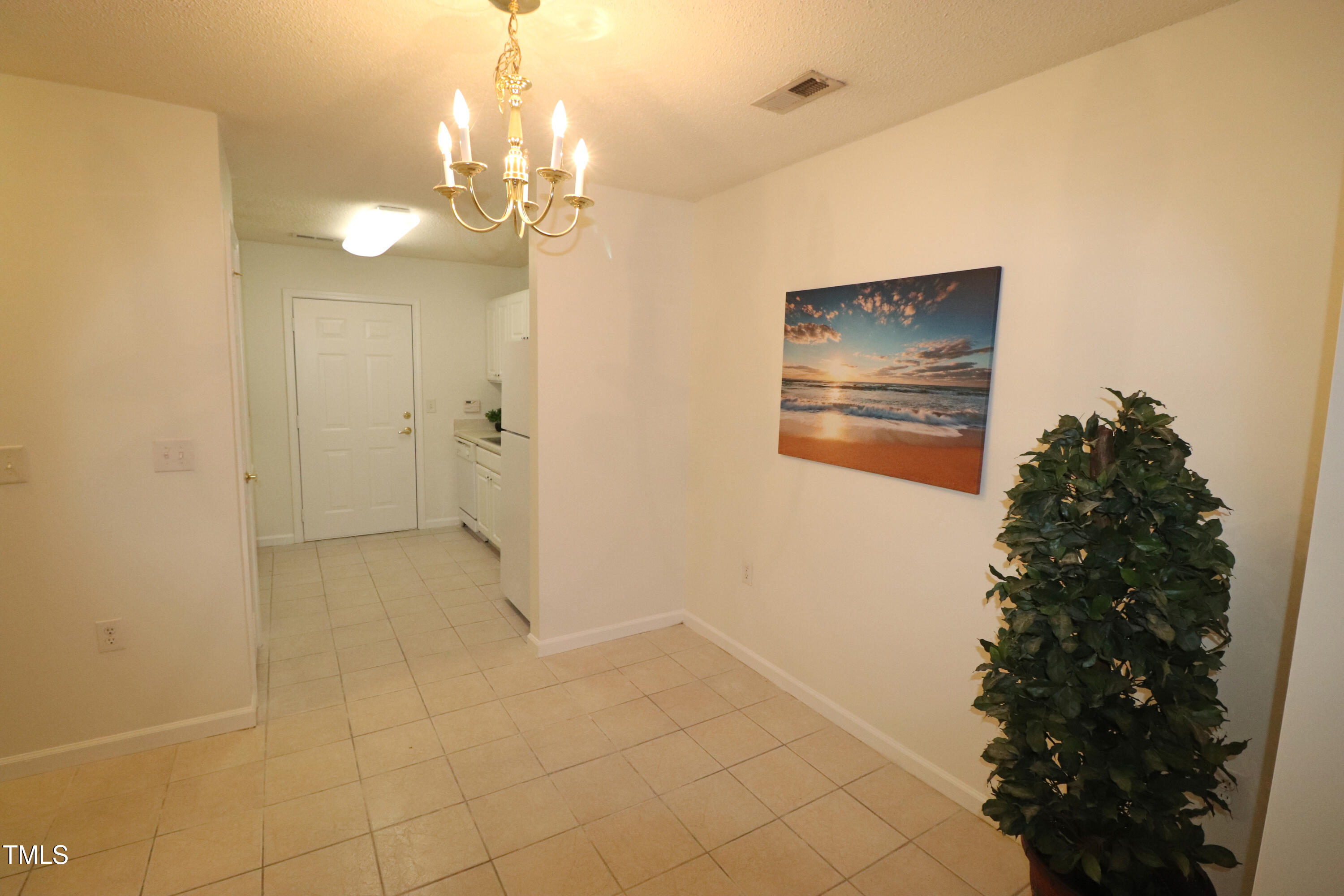 11321 Involute Place, Unit 102 Raleigh, NC 27617 - Photo 23 of 37 Dining to kitchen
