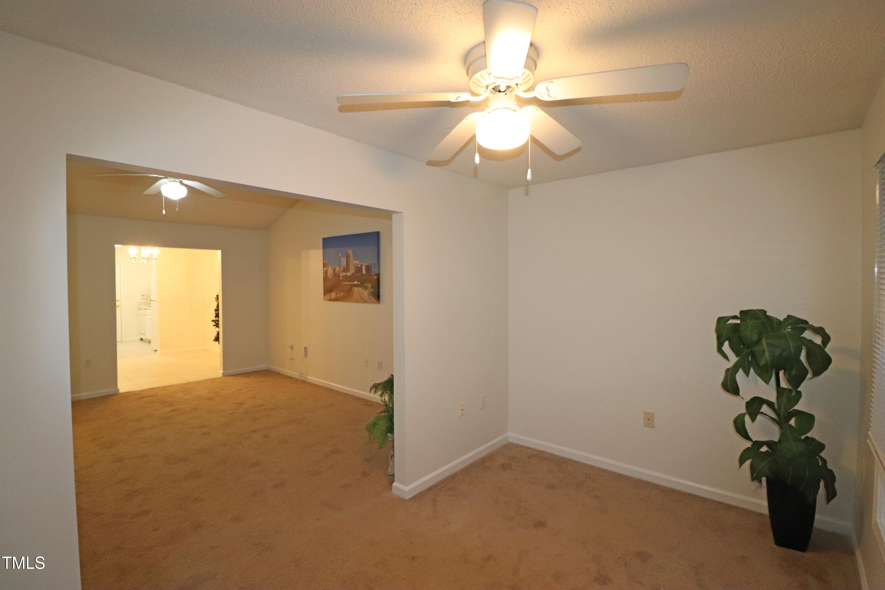 11321 Involute Place, Unit 102 Raleigh, NC 27617 - Photo 27 of 37 Sun room to living room