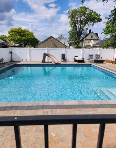 a view of a yard with a barn