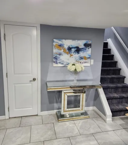 a stove top oven sitting inside of a kitchen