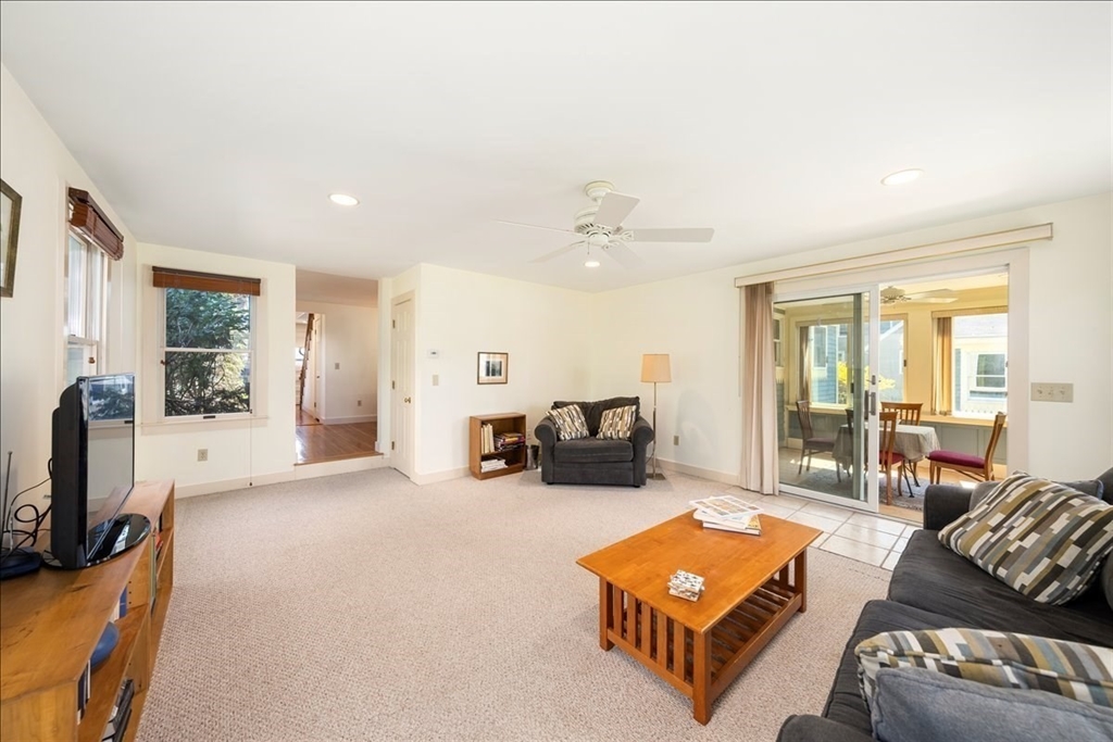 10 2nd Street Natick, MA 01760 - Photo 11 of 31 a living room with furniture and a flat screen tv