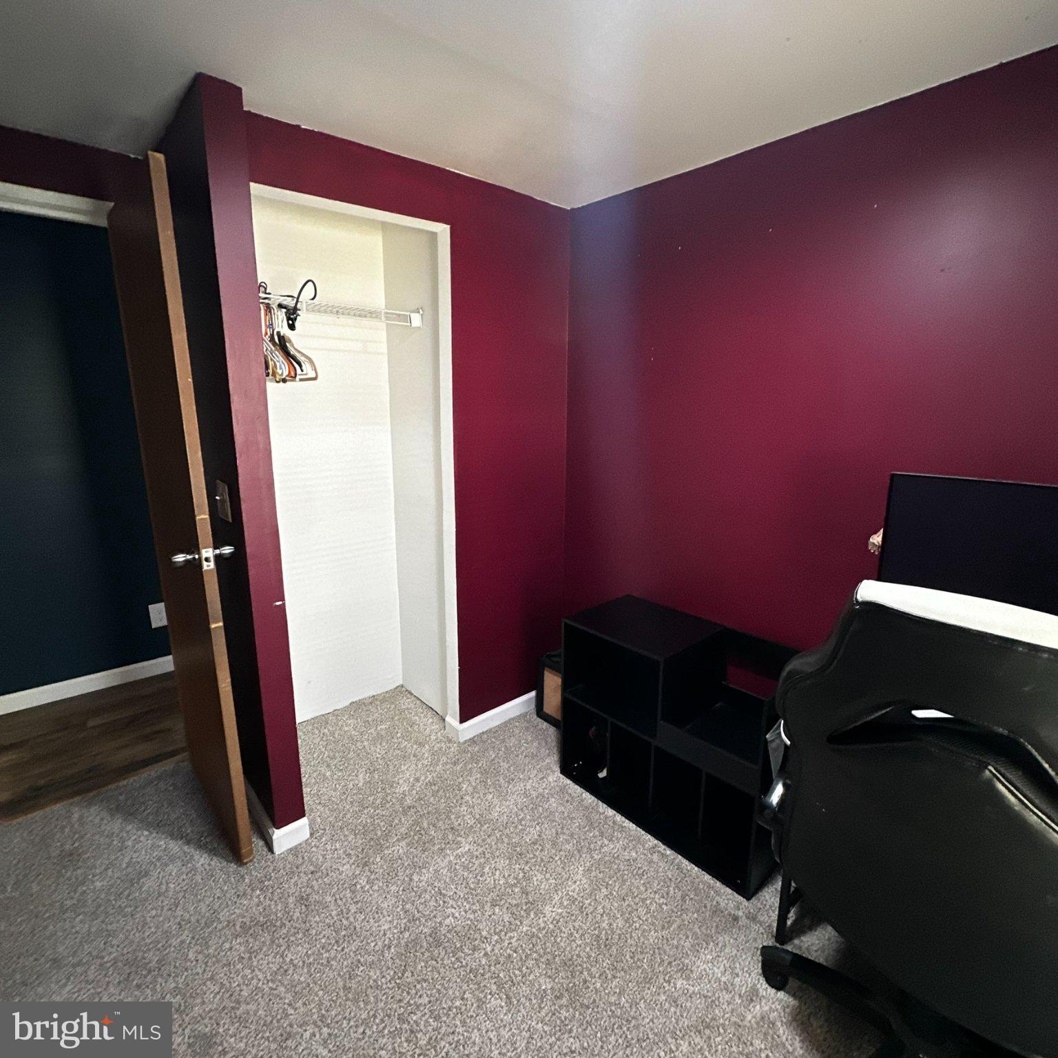 31777 Siham Road Lewes, DE 19958 - Photo 11 of 46 Cozy room with rich burgundy walls.