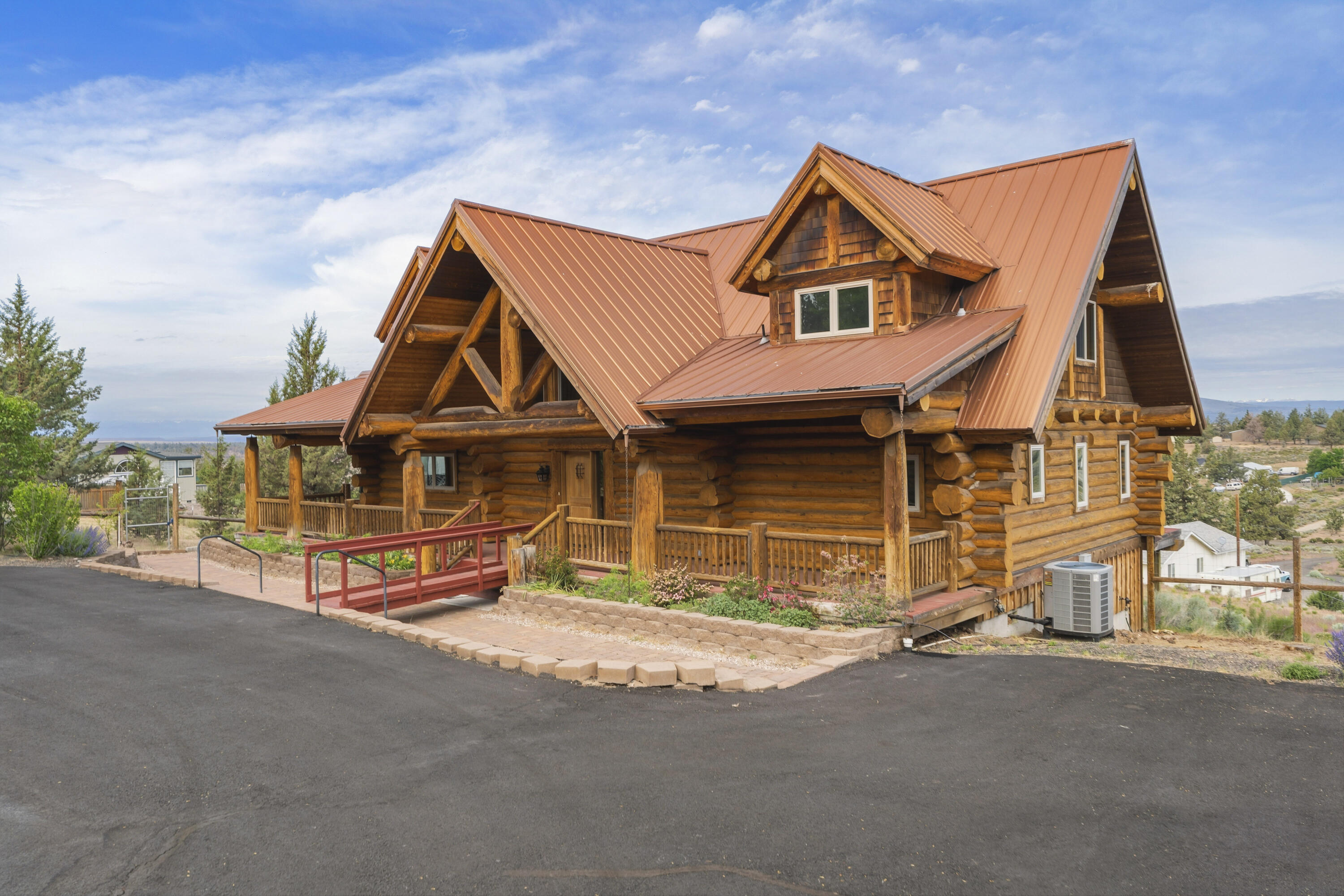 10739 Southwest Shad Road Terrebonne, OR 97760 - Photo 9 of 55 a view of a house with wooden fence