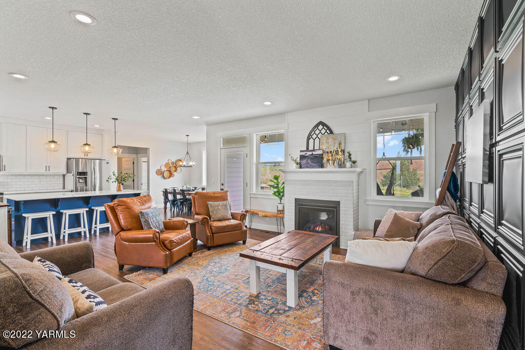 1058 East Road Bickleton, WA 99322 - Photo 18 of 39 a living room with furniture and a fireplace