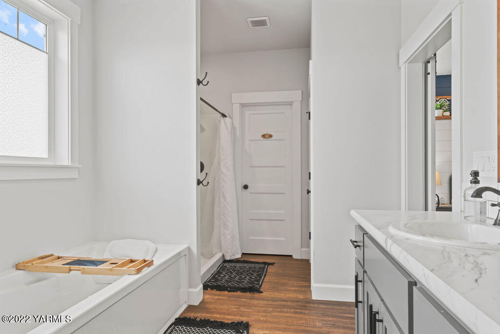 1058 East Road Bickleton, WA 99322 - Photo 38 of 39 a bathroom with a sink and a mirror