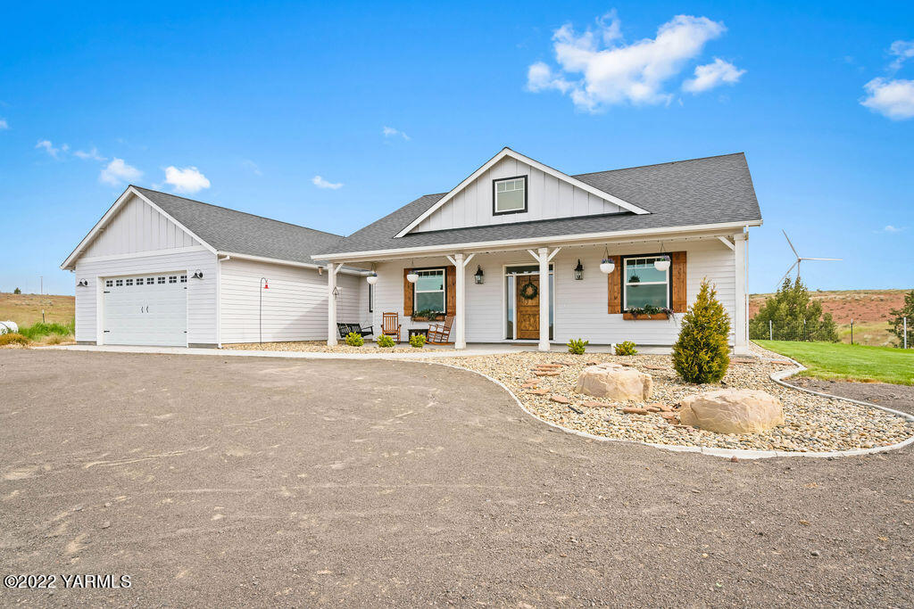1058 East Road Bickleton, WA 99322 - Photo 8 of 39 a view of a house with a outdoor space and chandelier