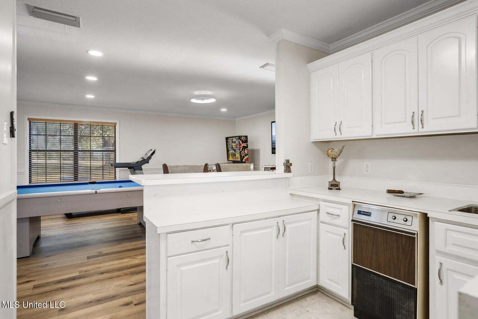 113 Lucas Road Sumrall, MS 39482 - Photo 23 of 52 Wet Bar Between Game Room and Great Room