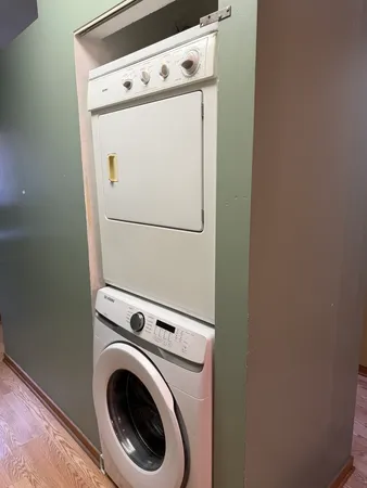 a bathroom with a tub and a shower