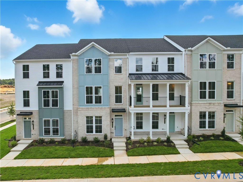 15307 Sunray Way Chesterfield, VA 23832 - Photo 24 of 27 a front view of a residential apartment building with a yard