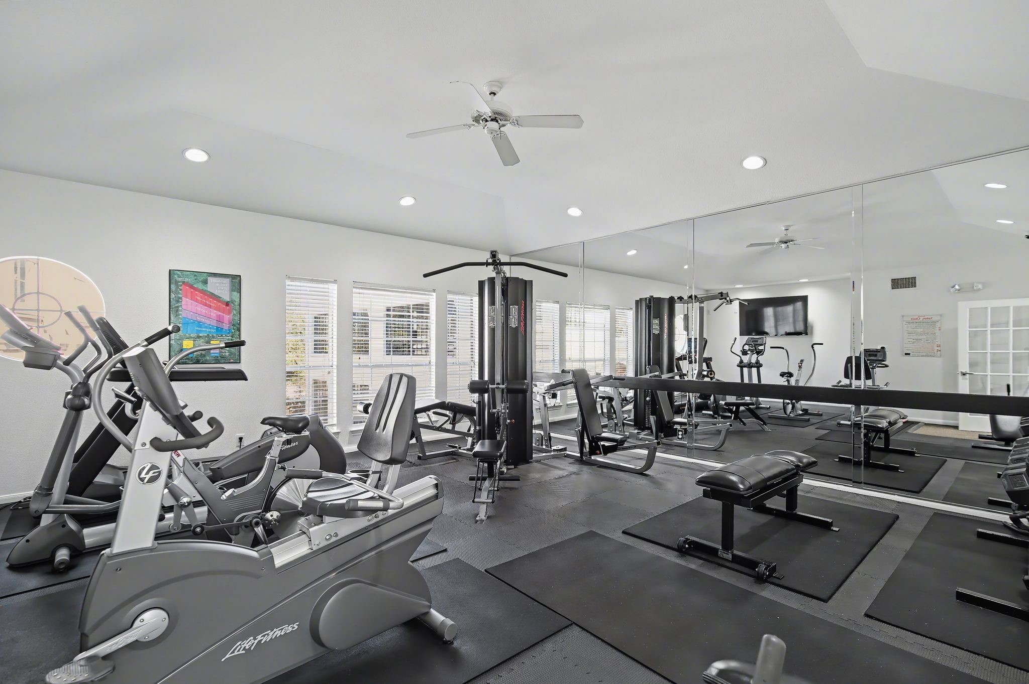 3231 Allen Parkway, Unit 2104 Houston, TX 77019 - Photo 14 of 14 a view of a room with gym equipment