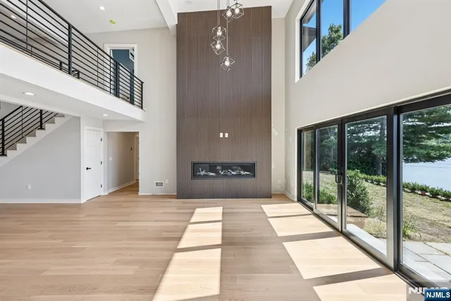 a view of swimming pool with a balcony