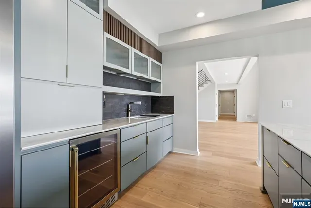 a hallway with cabinets