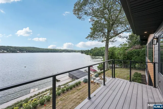 a view of mountain with wooden deck