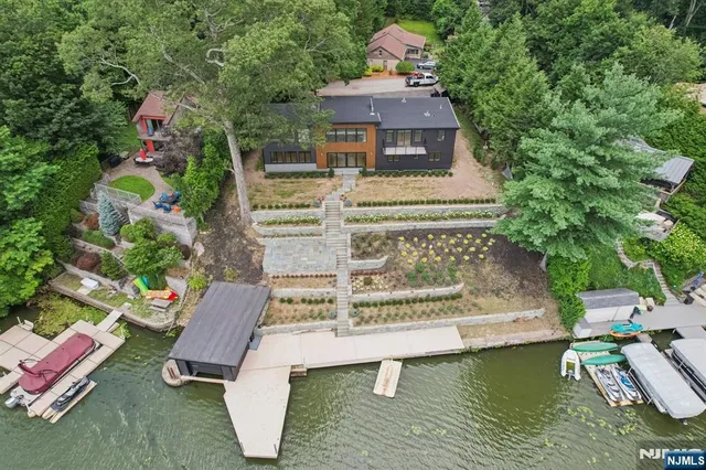a view of a swimming pool with lounge chairs
