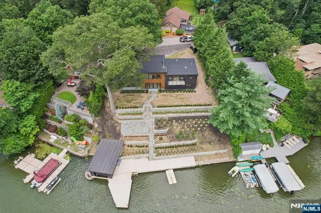 an aerial view of a house with a garden