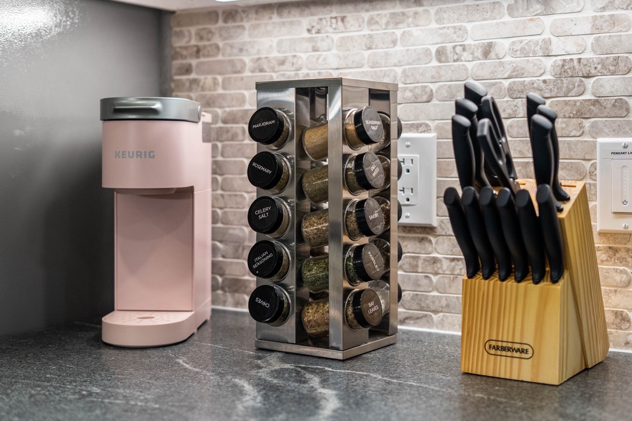 3138 Sunbeam Street Houston, TX 77051 - Photo 23 of 50 From morning coffee to gourmet dinners, this stylish prep station blends convenience, organization, and modern sophistication.