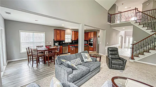 a view of walk in closet with clothes