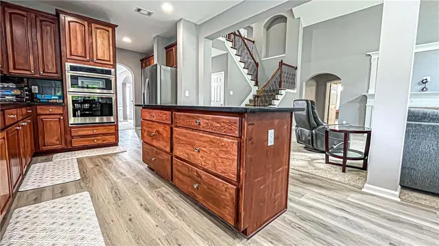 a view of a hallway with a bathroom