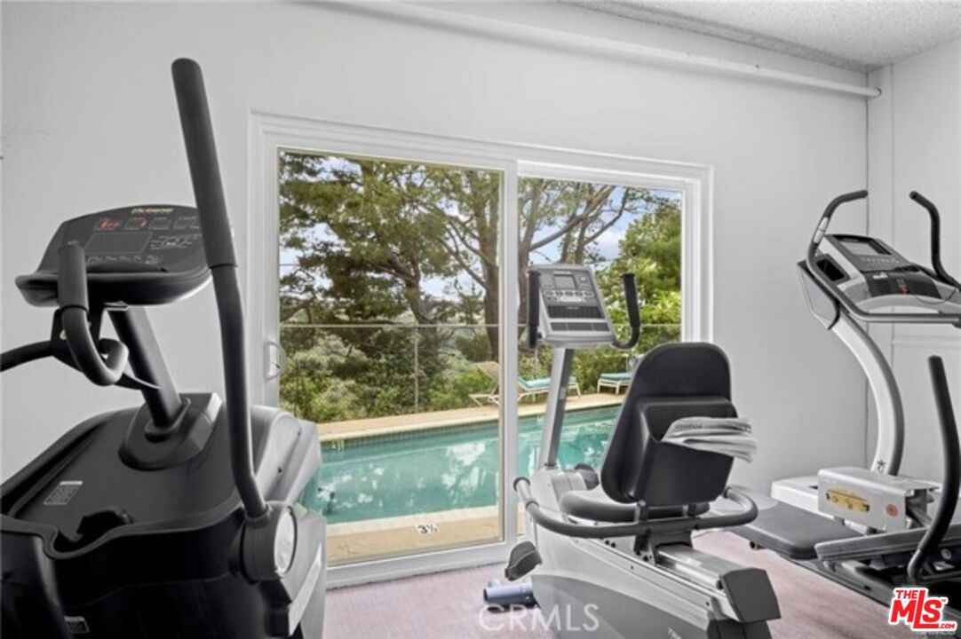 2345 Roscomare Road, Unit 201 Los Angeles, CA 90077 - Photo 17 of 18 a view of a workspace with gym equipment