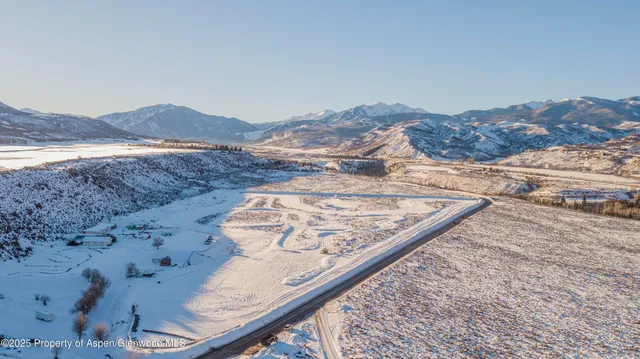 a view of mountains and valleys