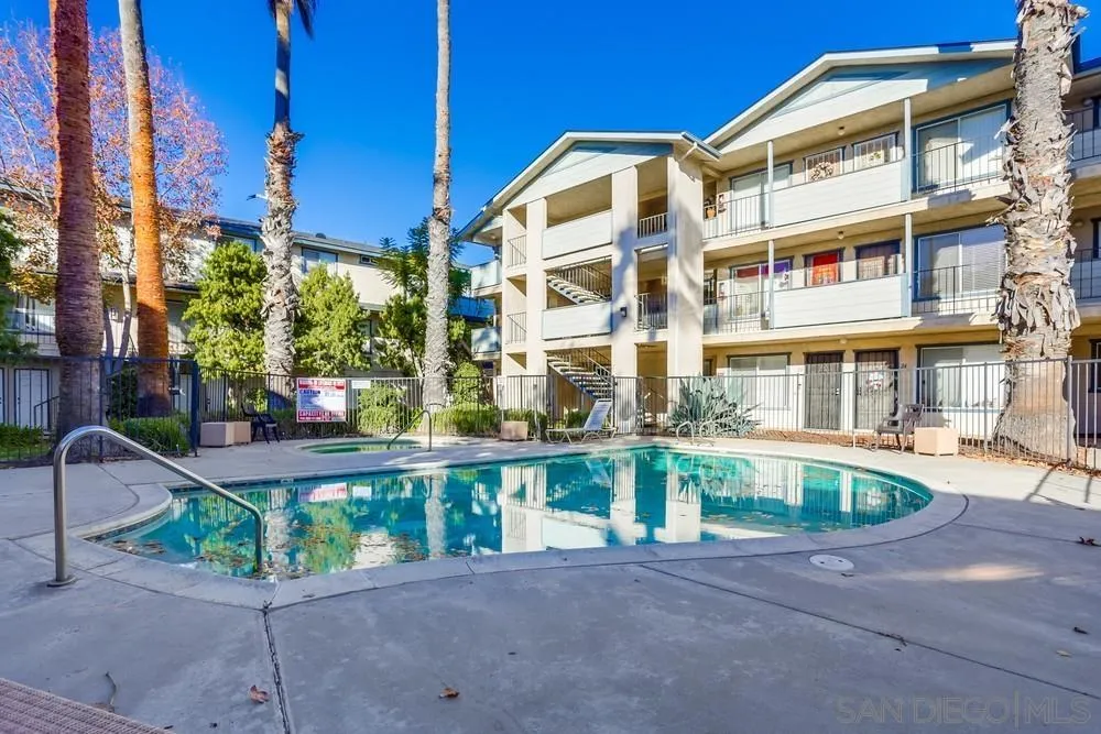 569 E Street, Unit 27 Chula Vista, CA 91910 - Photo 17 of 20 a front view of a building with a garden and plants