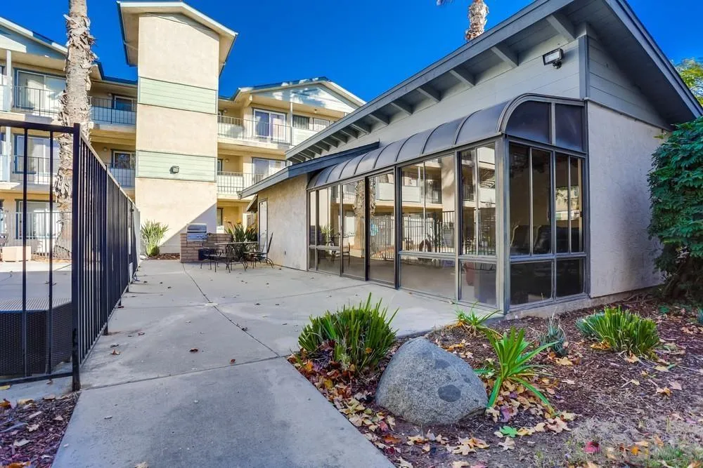 569 E Street, Unit 27 Chula Vista, CA 91910 - Photo 18 of 20 a front view of a house with garden