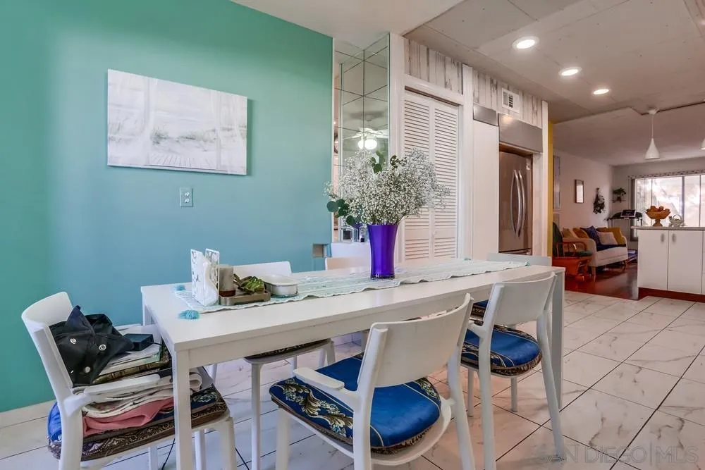 569 E Street, Unit 27 Chula Vista, CA 91910 - Photo 8 of 20 a dining room with furniture and window