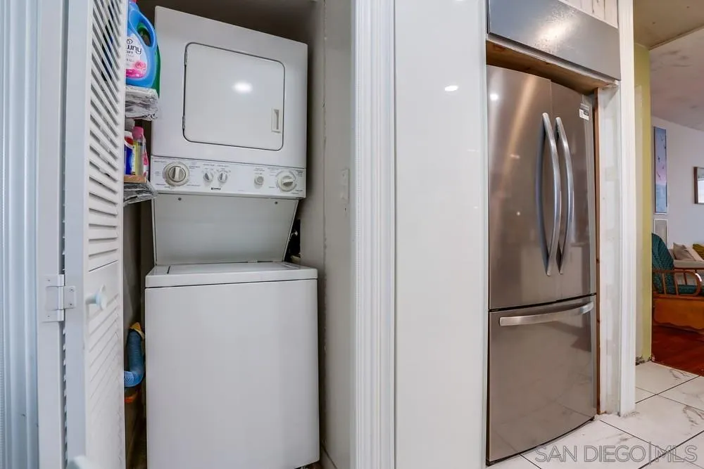 569 E Street, Unit 27 Chula Vista, CA 91910 - Photo 10 of 20 a utility room with dryer and washer