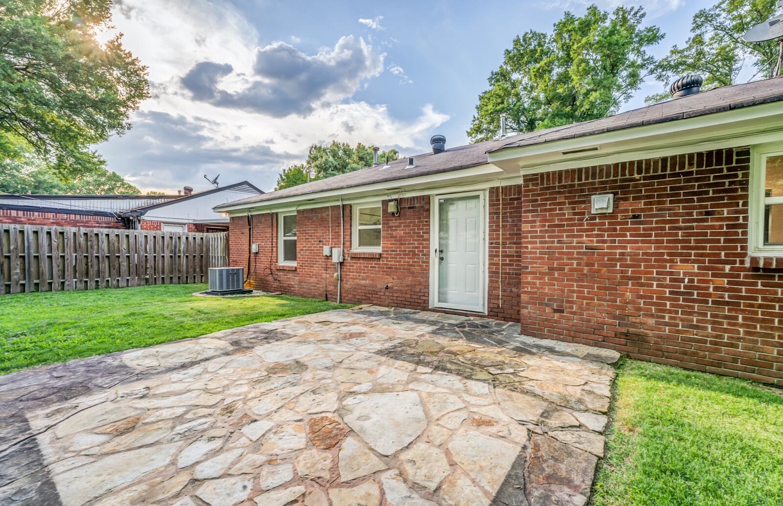 4613 Boyce Road Memphis, TN 38117 - Photo 29 of 35 a view of a house with a yard