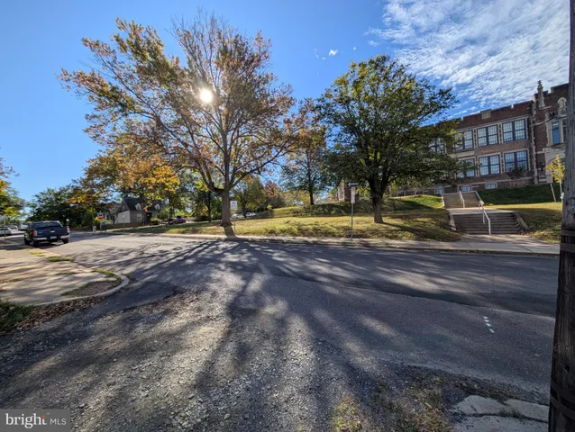 a view of swimming pool with a yard