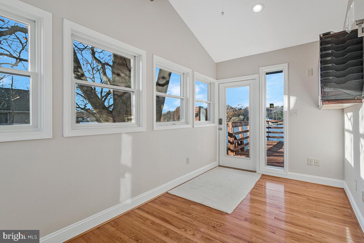 962 Main Street Deale, MD 20751 - Photo 23 of 54 a view of an empty room with window and wooden floor