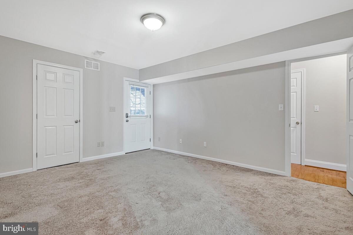 962 Main Street Deale, MD 20751 - Photo 25 of 54 an empty room with windows